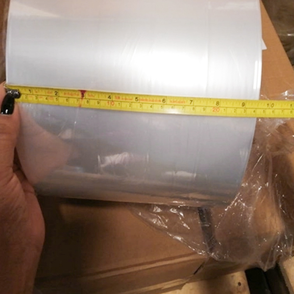 200 mm - 1400 mm Dwuwarstwowa folia termokurczliwa z mikroperforowanej poliolefiny o grubości 17 mikronów do produktów mlecznych